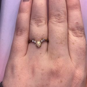 gold ring with opal and gems